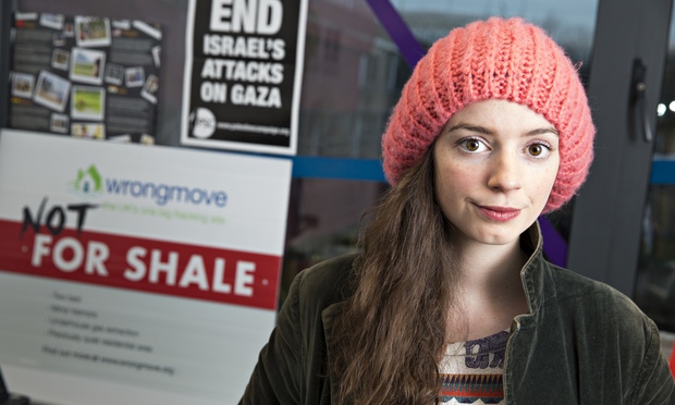 Laura Clayson, Lancaster's students' union president, with the posters that attracted police attention. Photograph: Christopher Thomond for the Guardian